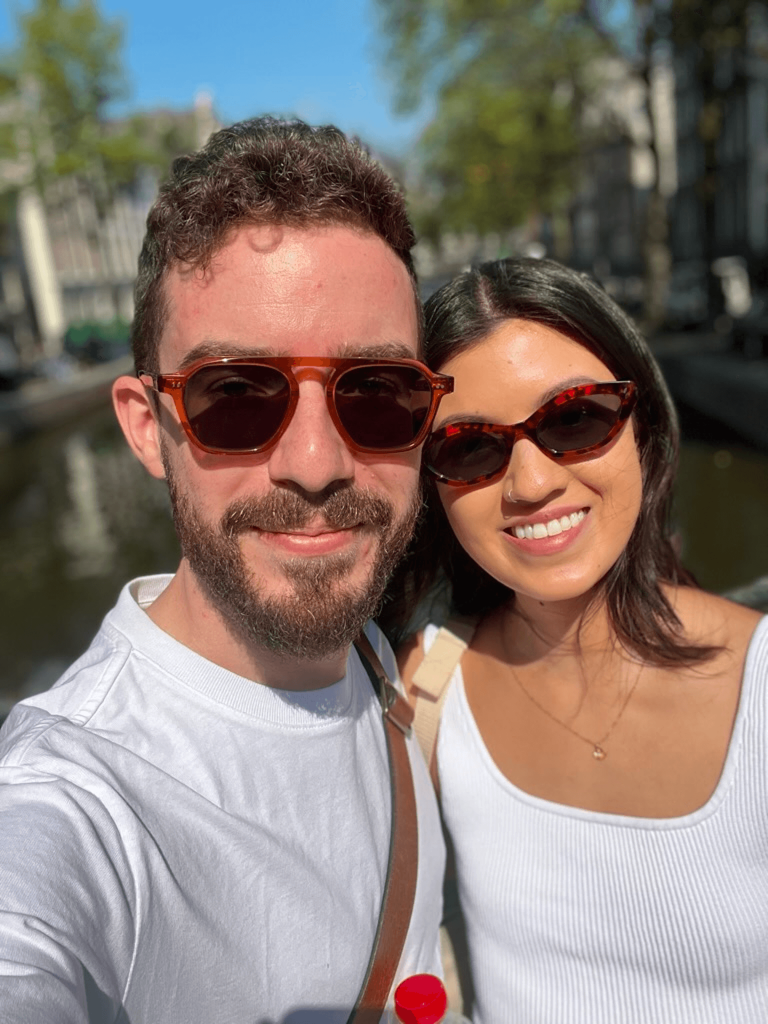 Delanie and Jonathan by a canal in Amsterdam