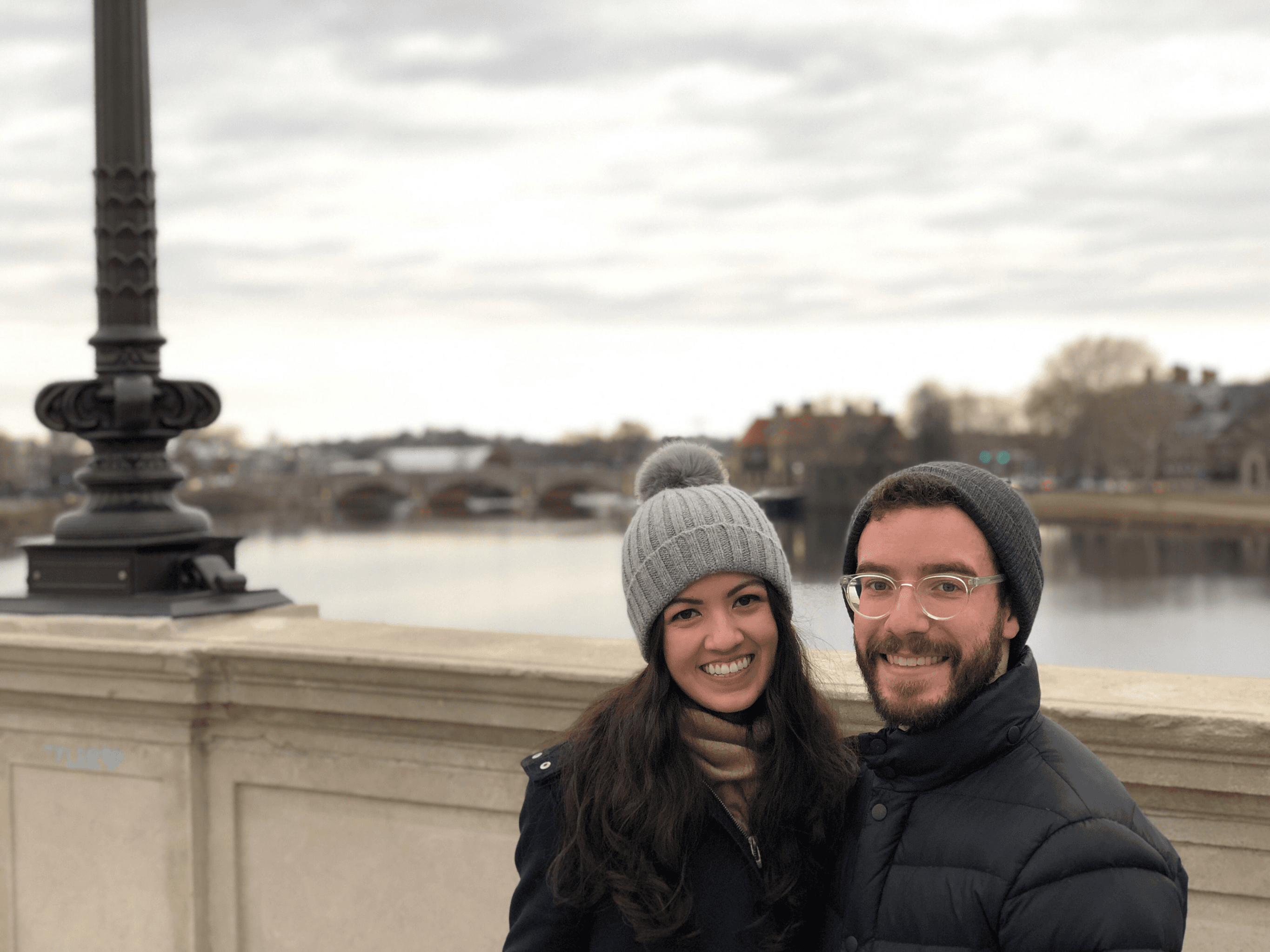 Delanie and Jonathan on a bridge in Cambridge